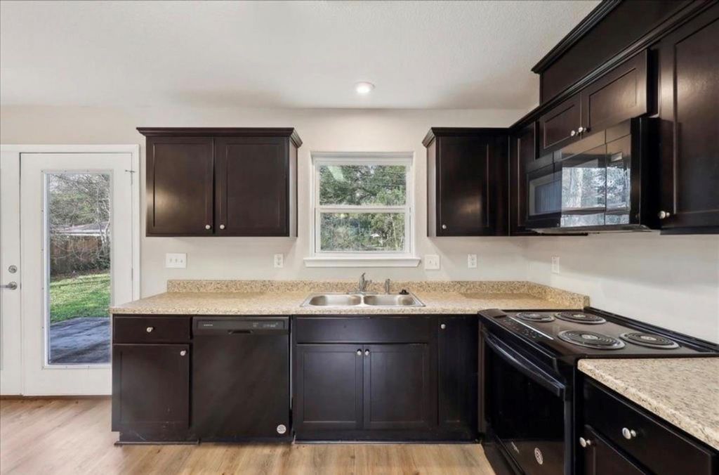 Photo of 8670 Newfield Lane, Beaumont, TX 77707 (MLS # 64169324)