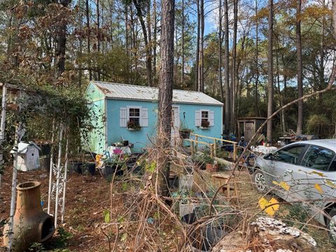 Photo of 8249 Soapberry Lane, Plantersville, TX 77363 (MLS # 58068448)