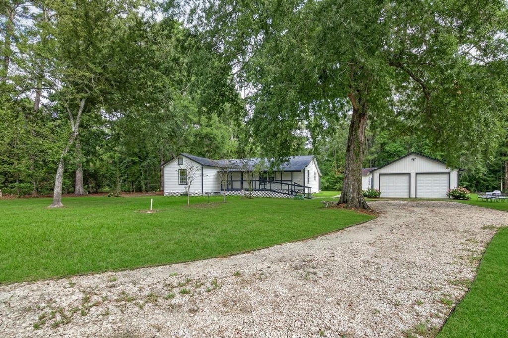 Photo of 17073 Oak Grove Ln LN, New Caney, TX 77357 (MLS # 19208349)