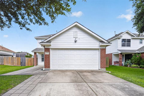Photo of 12710 Paso Del Flores Drive, Houston, TX 77045 (MLS # 54336338)
