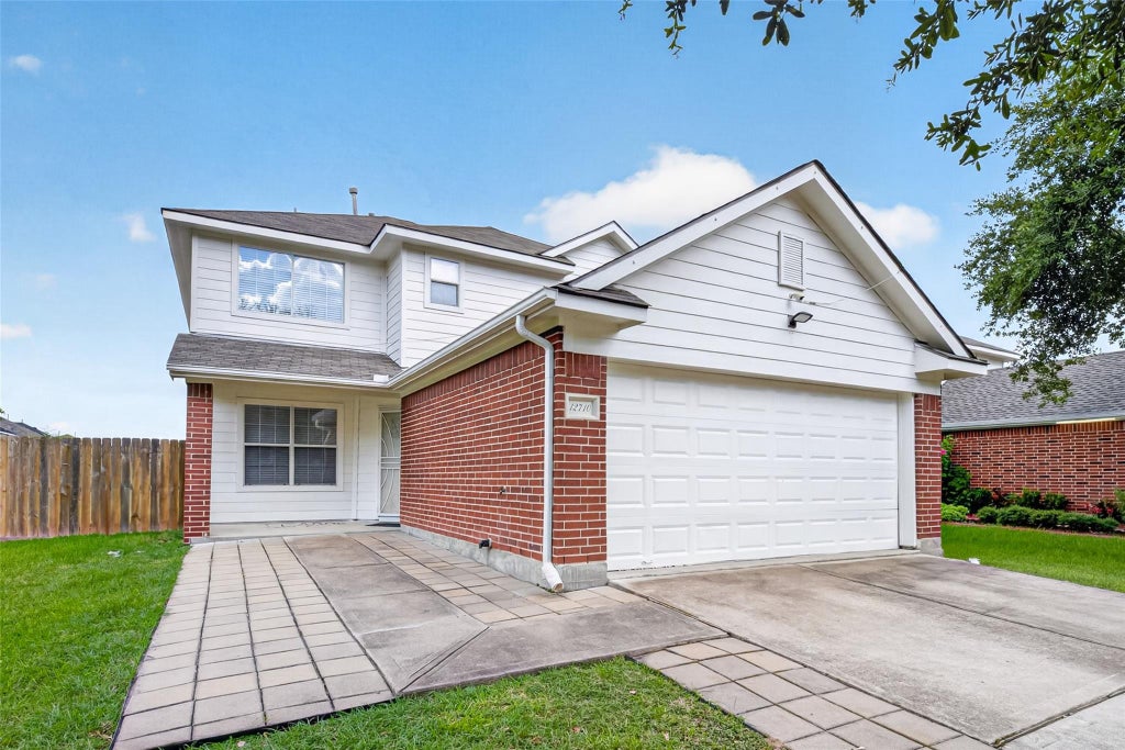 Photo of 12710 Paso Del Flores Drive, Houston, TX 77045 (MLS # 54336338)