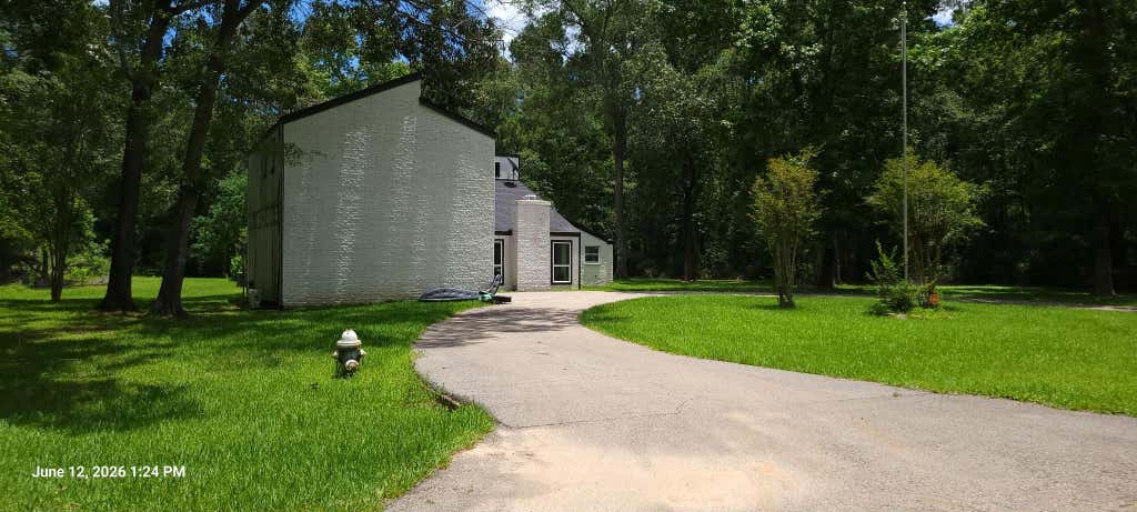 Photo of 854 Fairway Drive, New Caney, TX 77357 (MLS # 79286290)