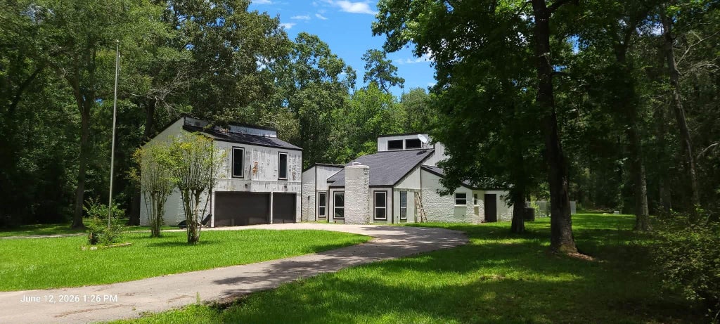 Photo of 854 Fairway Drive, New Caney, TX 77357 (MLS # 79286290)