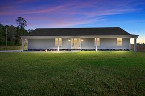 Photo of 10025 Plum Grove Road, Cleveland, TX 77327 (MLS # 92614424)