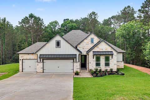 Photo of 9632 Moss Rose LN, Willis, TX 77378 (MLS # 58655279)