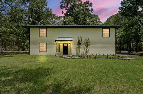 Photo of 410 Oak Knoll Road, Cleveland, TX 77328 (MLS # 50826920)