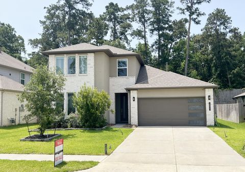 Photo of 10023 Angelina Woods Lane, Conroe, TX 77384 (MLS # 52820307)