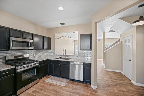 Photo of 9706 Coyote Creek Drive, Houston, TX 77095 (MLS # 15189531)