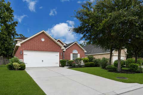 Photo of 31 Hearthwick Road, Tomball, TX 77375 (MLS # 36402970)