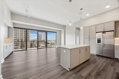 Photo of 9757 Katy Freeway #823, Houston, TX 77024 (MLS # 96473009)