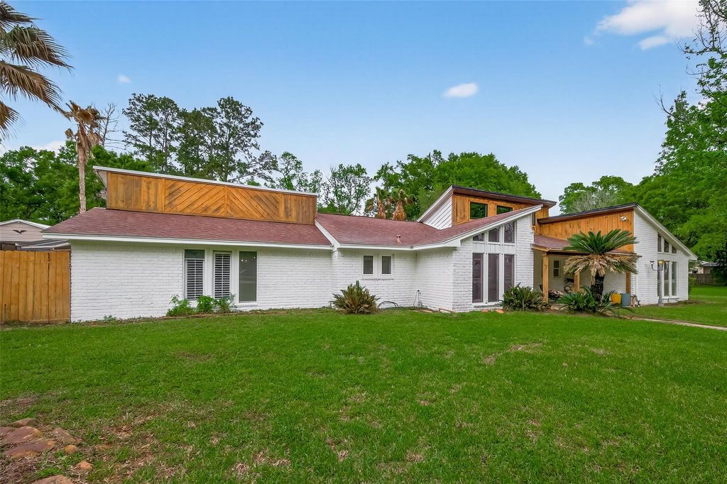 Photo of 2411 Roman Forest Boulevard, New Caney, TX 77357 (MLS # 53027354)