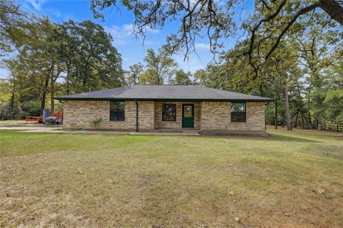 Photo of 98 Lee Wood Road, Huntsville, TX 77320 (MLS # 52932526)
