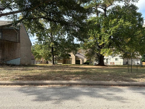 Photo of 654 Cherry Hills Drive, Huntsville, TX 77340 (MLS # 55873669)