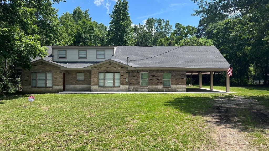 Photo of 47 Blue Lake Drive, Huffman, TX 77336 (MLS # 66390914)