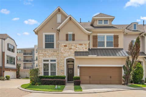 Photo of 1407 Devonshire Manor Lane, Houston, TX 77055 (MLS # 21239407)
