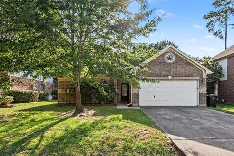 Photo of 28715 Hidden Cove Drive, Magnolia, TX 77354 (MLS # 29770168)