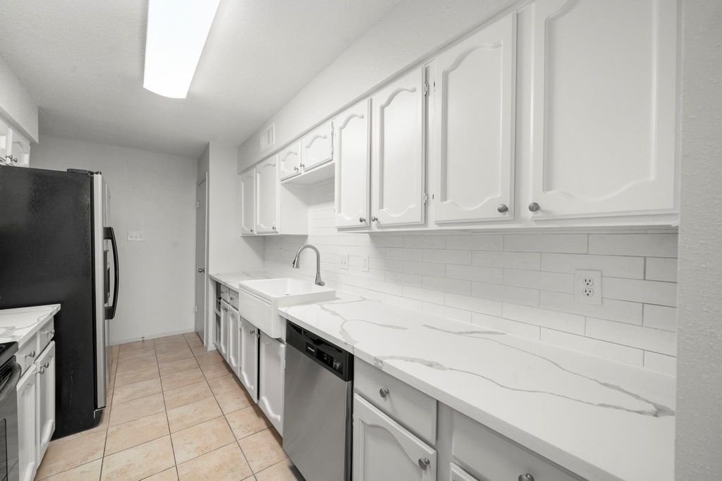 Photo of 7847 Green Lawn Drive #7847, Houston, TX 77088 (MLS # 75571658)