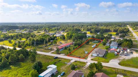 Photo of 1200 County Road 5017, Cleveland, TX 77327 (MLS # 97065842)