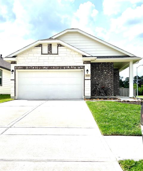 Photo of 10406 Milford Woods Lane, Tomball, TX 77375 (MLS # 48236447)