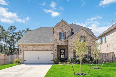 Photo of 1384 Knollbridge Point Lane, Pinehurst, TX 77362 (MLS # 86365677)