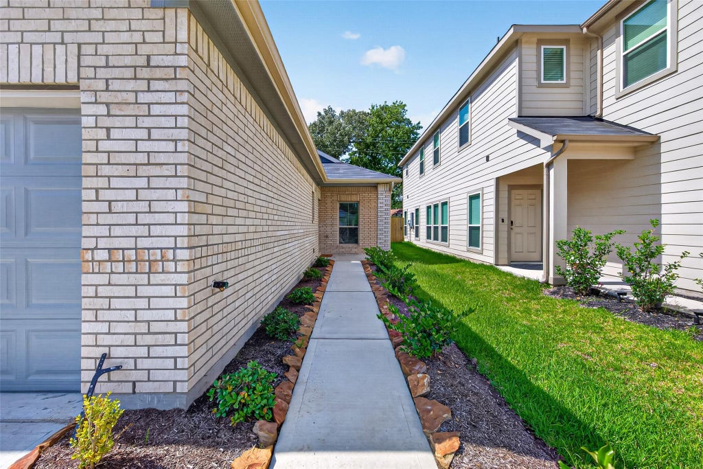 Photo of 516 Emerald Thicket Ln, Huffman, TX 77336 (MLS # 66265912)