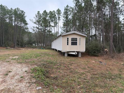 Photo of 7913 Hawthorne Lane, Plantersville, TX 77363 (MLS # 96235797)