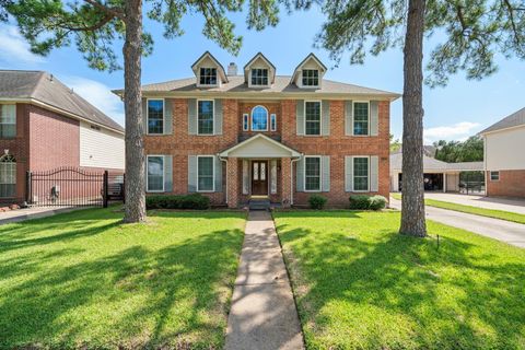 Photo of 12819 Orchard Hollow Way, Houston, TX 77065 (MLS # 38819446)