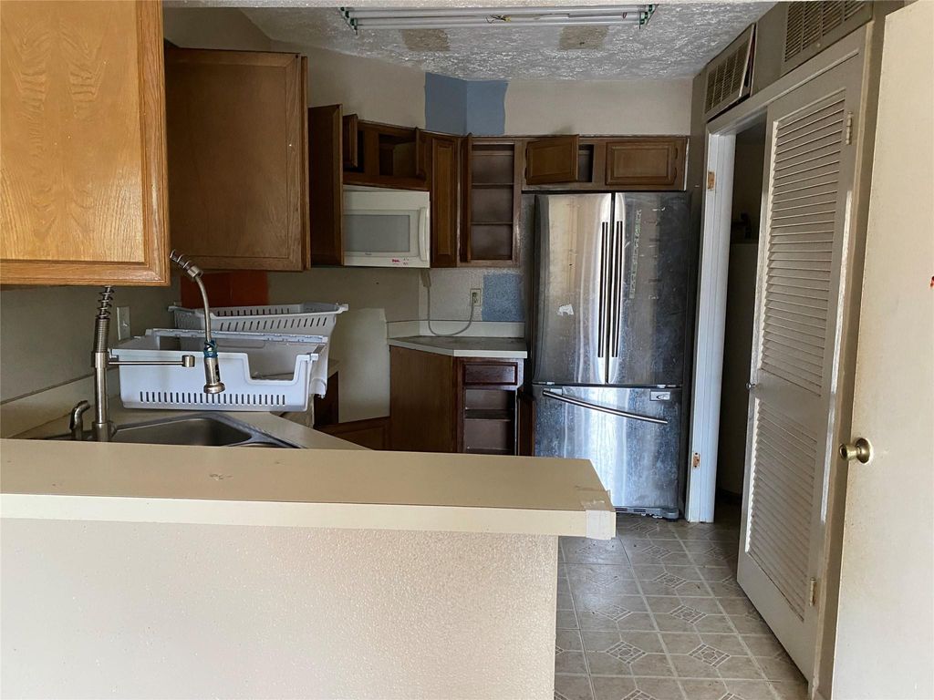 Photo of 10555 Turtlewood Court #2703, Houston, TX 77072 (MLS # 64783098)