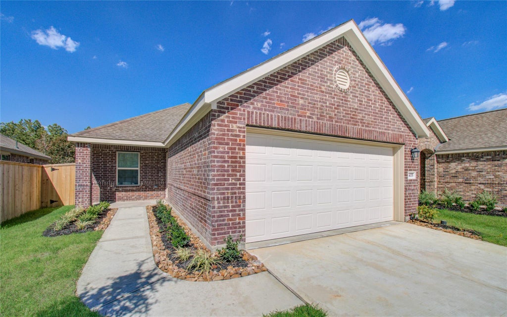 Photo of 24035 Priano Forest Dr Dr, New Caney, TX 77357 (MLS # 81097428)
