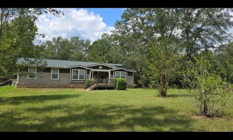 Photo of 427 County Road 4822, Timpson, TX 75975 (MLS # 16898061)