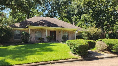 Photo of 2230 Tangle Lake Drive, Houston, TX 77339 (MLS # 10329892)