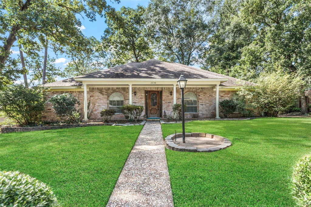 Photo of 2230 Tangle Lake Drive, Houston, TX 77339 (MLS # 10329892)