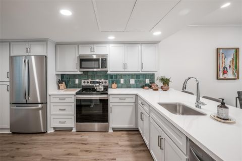 Photo of 14723 Barryknoll Lane #107, Houston, TX 77079 (MLS # 87053321)