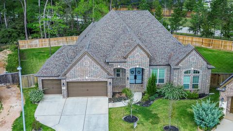 Photo of 1050 Groveton Ridge Lane, Pinehurst, TX 77362 (MLS # 60941079)