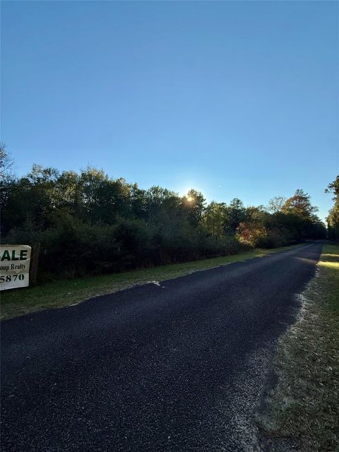 Photo of 854 County Road 2125, Cleveland, TX 77327 (MLS # 77931492)