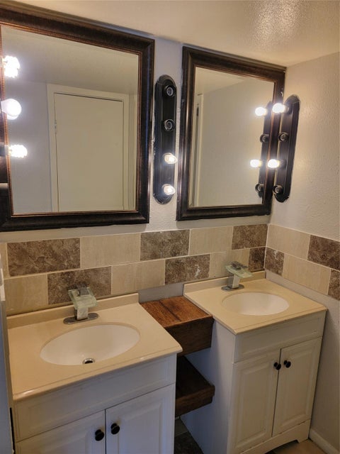 Photo of 8901 S Braeswood Boulevard #107, Houston, TX 77074 (MLS # 50205132)