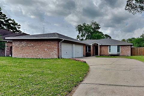 Photo of 14318 Ella Lee Lane, Houston, TX 77077 (MLS # 88805416)