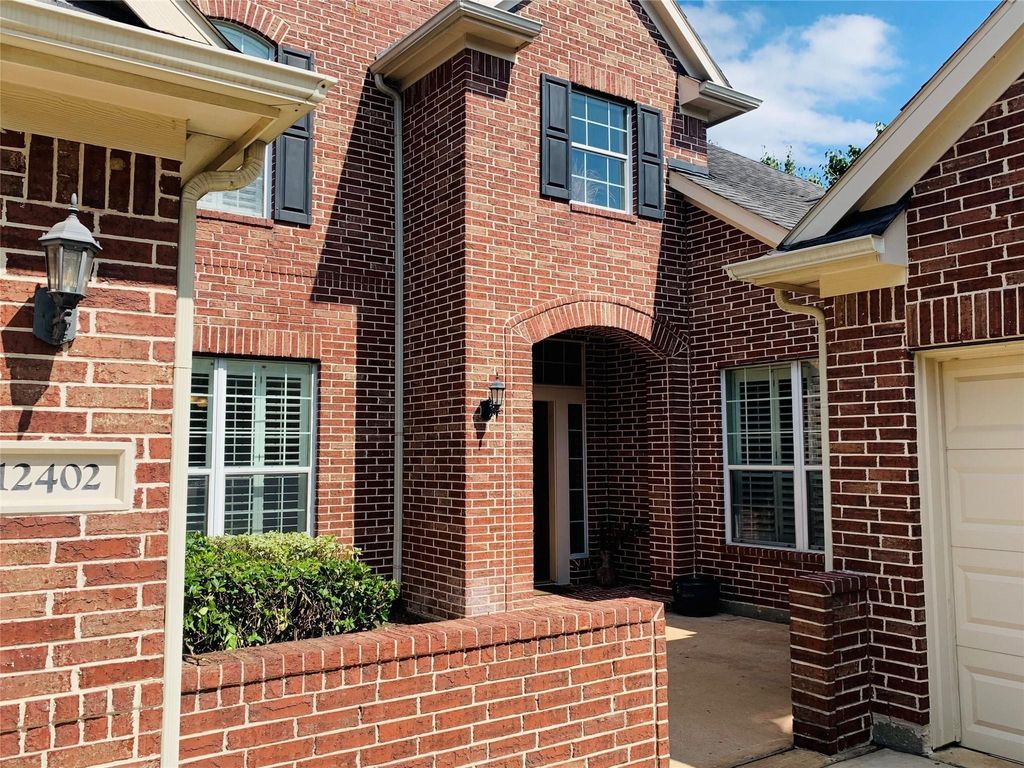 Photo of 12402 Santiago Cove Lane, Houston, TX 77041 (MLS # 39163316)