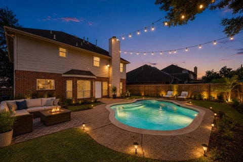 Photo of 12206 Meadow Park Court, Meadows Place, TX 77477 (MLS # 49411236)