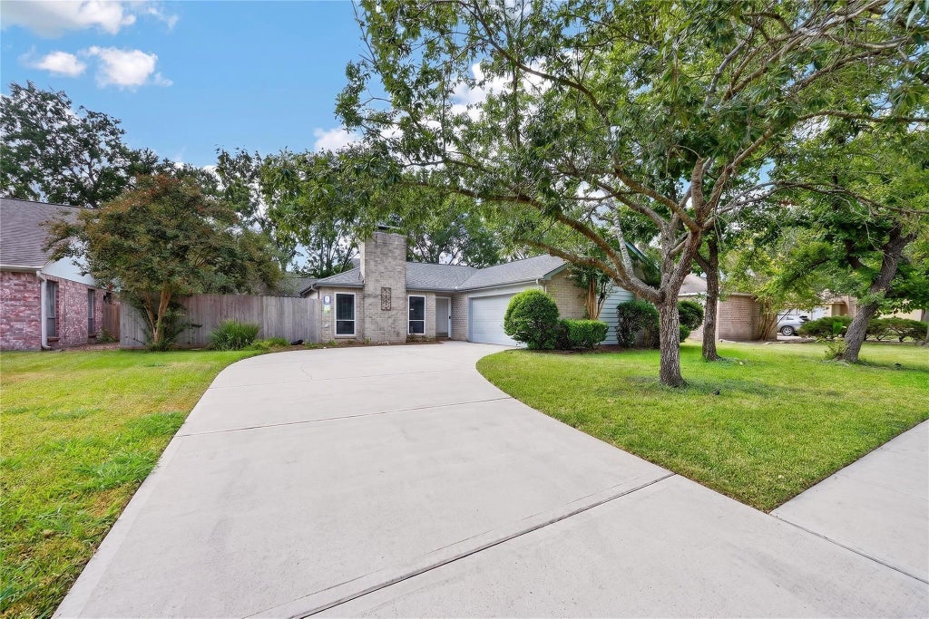 Photo of 12135 Ella Lee Lane, Houston, TX 77077 (MLS # 58579385)