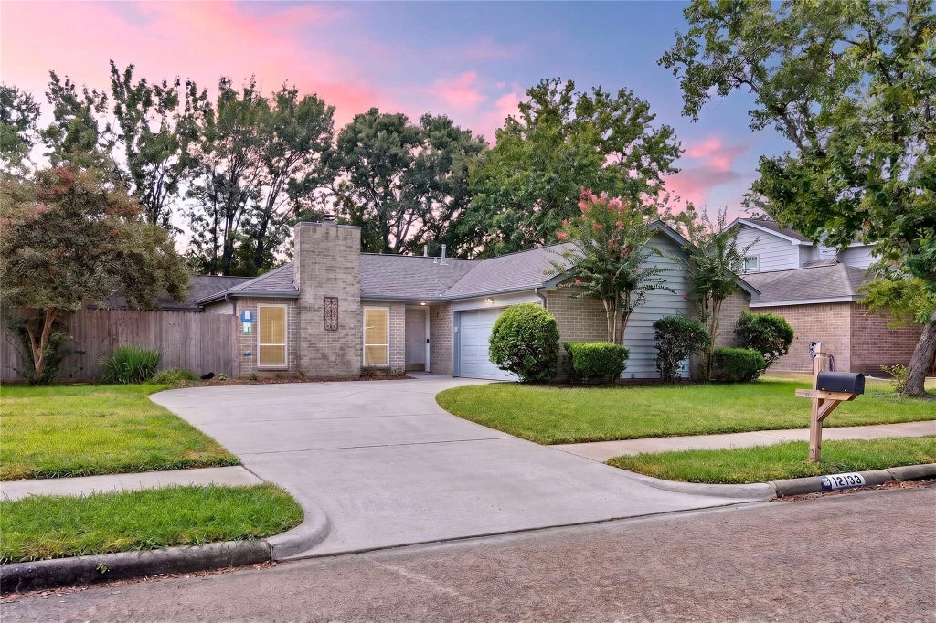 Photo of 12135 Ella Lee Lane, Houston, TX 77077 (MLS # 58579385)