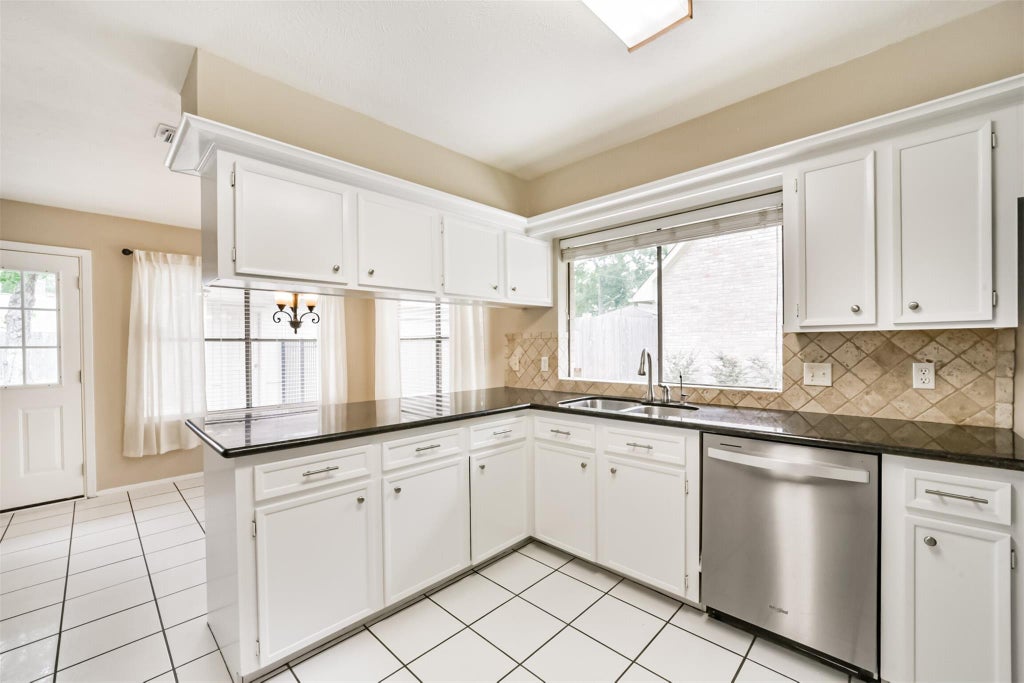 Photo of 3703 Brook Shadow Drive, Houston, TX 77345 (MLS # 46336512)