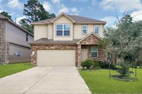 Photo of 4274 Mcgregor Bluff Lane, Conroe, TX 77304 (MLS # 12704917)