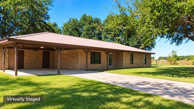 Photo 1 of 24 — 2672 County Road 569, Kirbyville, TX 75956