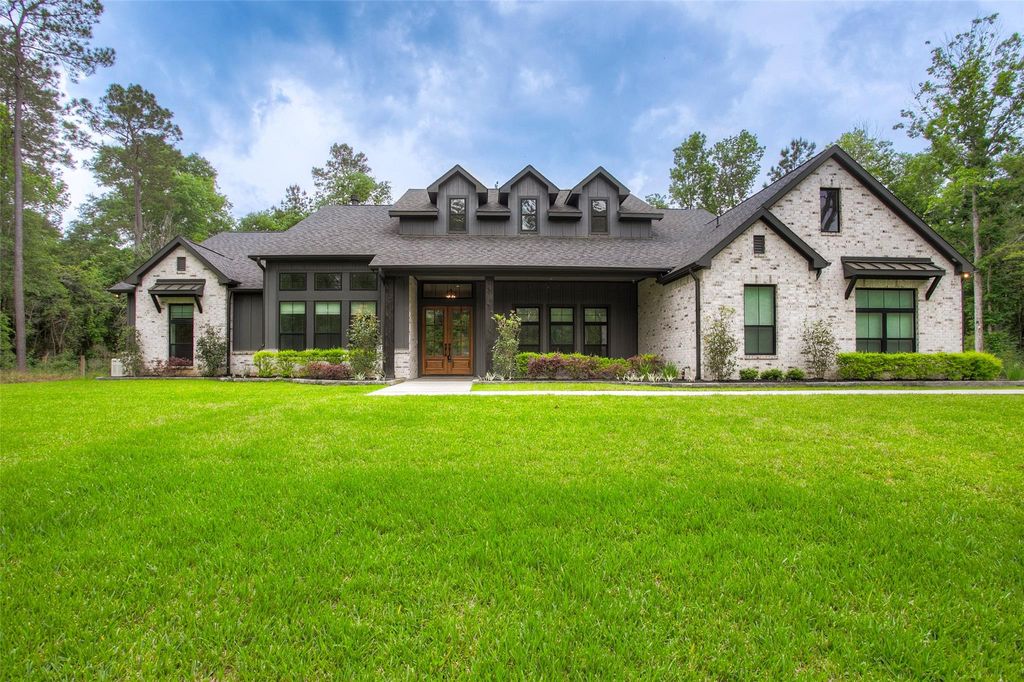 Photo of 12915 Oak Barrel Road, Willis, TX 77378 (MLS # 12985057)