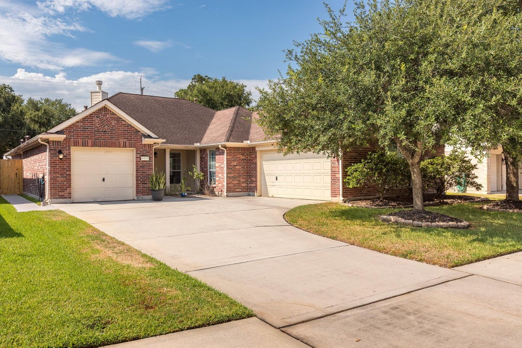 Photo of 9919 Memorial Crossing Drive, Tomball, TX 77375 (MLS # 35026717)