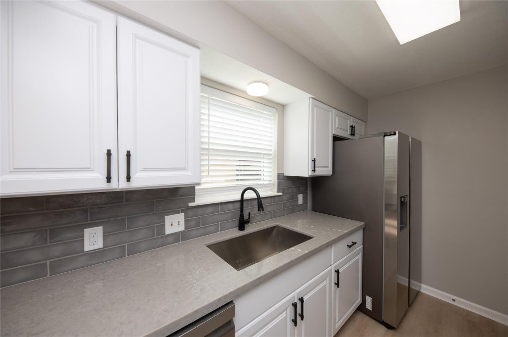 Photo of 4220 Belle Park Drive, Houston, TX 77072 (MLS # 31001598)