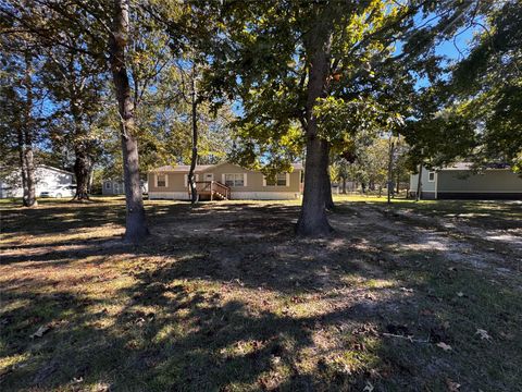 Photo of 78 County Road 3310a, Cleveland, TX 77327 (MLS # 20051995)