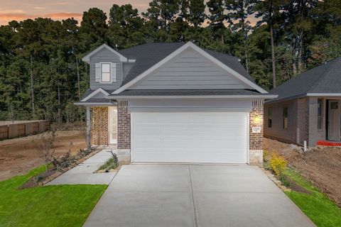 Photo of 12195 Ridge Top Drive, Conroe, TX 77304 (MLS # 16338173)