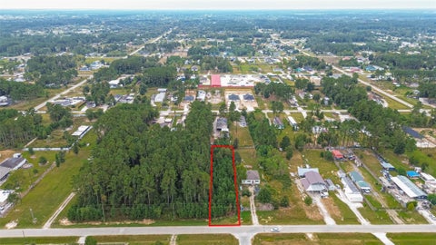 Photo of 146 County Road 5027, Cleveland, TX 77327 (MLS # 62998276)